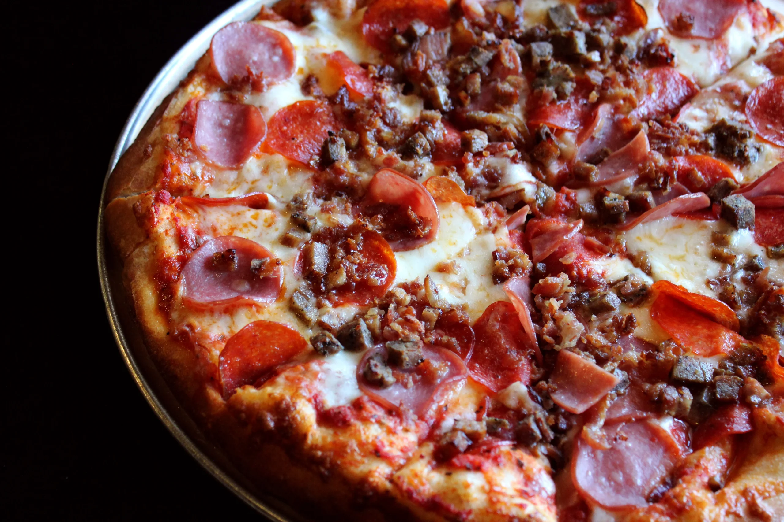 Wise Guys Pizzeria loaded meat lover's pizza